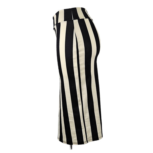 Side view of a black and cream high-waisted pencil skirt with vertical stripes, highlighting the silhouette and side seam.