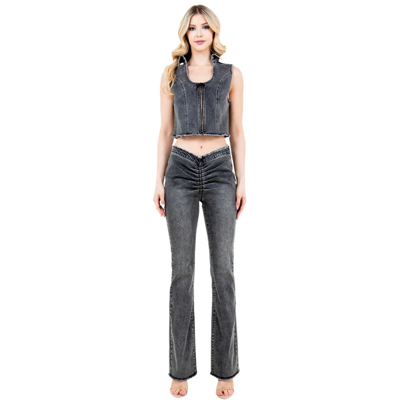 Load image into Gallery viewer, Full-body view of the outfit, featuring the vest paired with matching ruched black denim pants and a flared leg cut.
