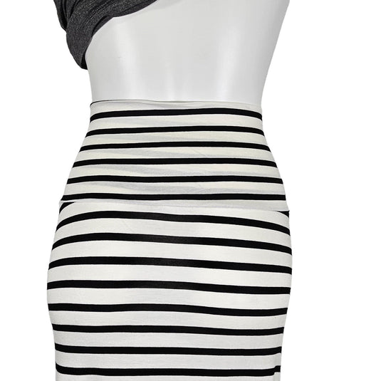 Detailed waist-up view of a black and white striped maxi skirt on a mannequin, highlighting the snug waistband and pattern consistency.