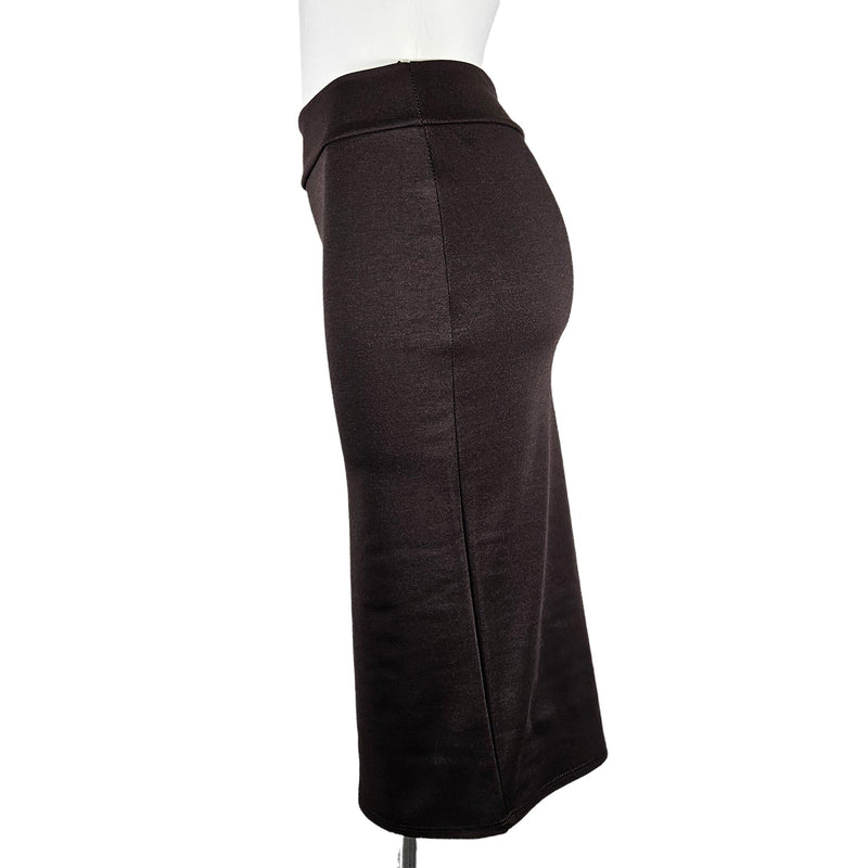 Load image into Gallery viewer, Side view of a mocha high-waisted pencil skirt on a mannequin, detailing the slim fit and the elegant, streamlined seam.
