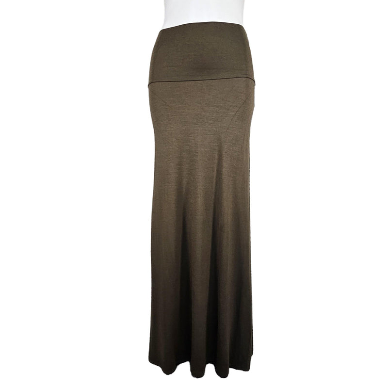 Load image into Gallery viewer, Front view of an elegant olive maxi skirt, showcasing its smooth texture and flowing lines, ideal for versatile styling.
