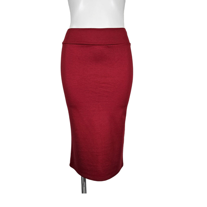 Load image into Gallery viewer, Front view of a red high-waisted pencil skirt on a mannequin, highlighting the garment&#39;s rich color and tailored fit.
