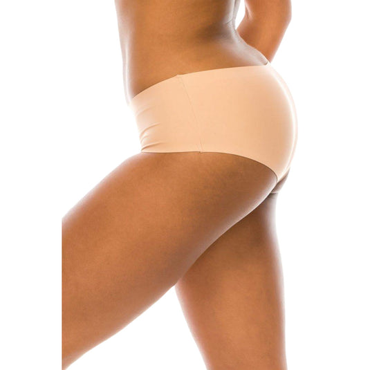 Side view of a woman wearing nude seamless boyshort panties. The smooth, no-show design provides a comfortable and invisible fit under any outfit.