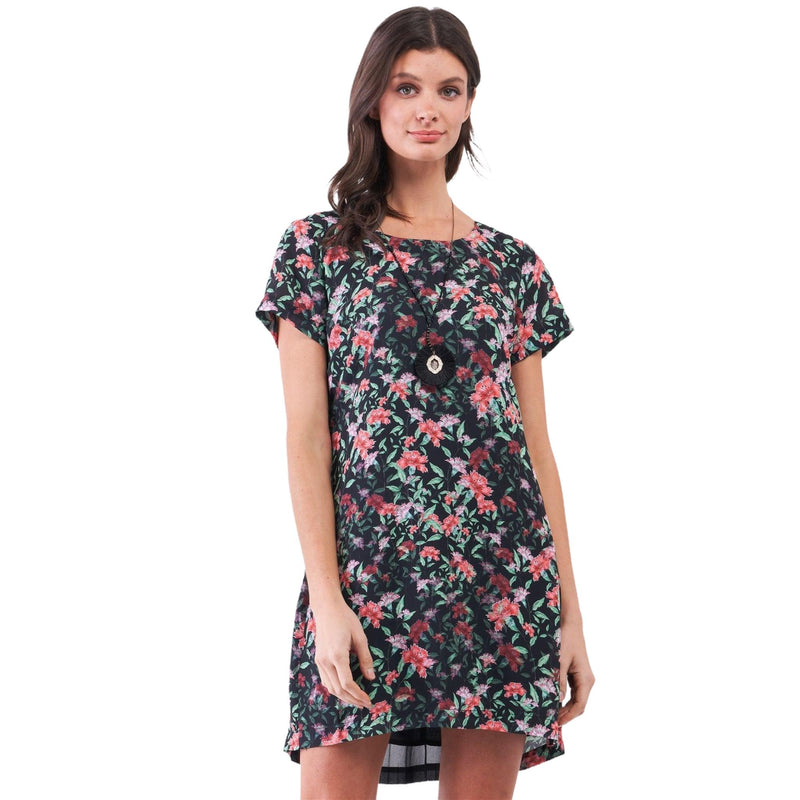 Load image into Gallery viewer, Portrait of a woman in a black mini dress with a vibrant floral pattern, featuring a round neckline and short sleeves, perfect for a casual summer day.
