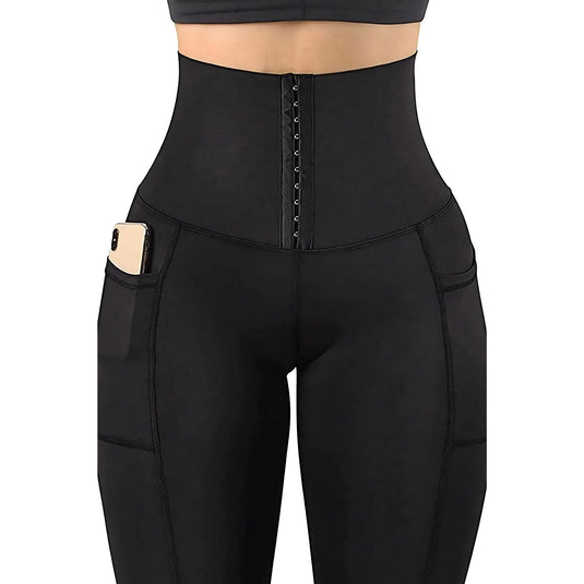 Close-up of black yoga leggings with high-rise waist and hook-eye closure for a secure and shaping fit during fitness activities.