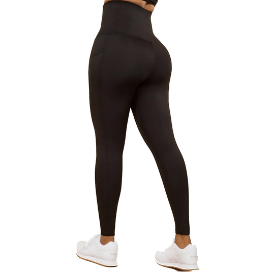 Rear view of snug-fit black yoga leggings highlighting the flattering silhouette and seamless design for modern athleisure wear.