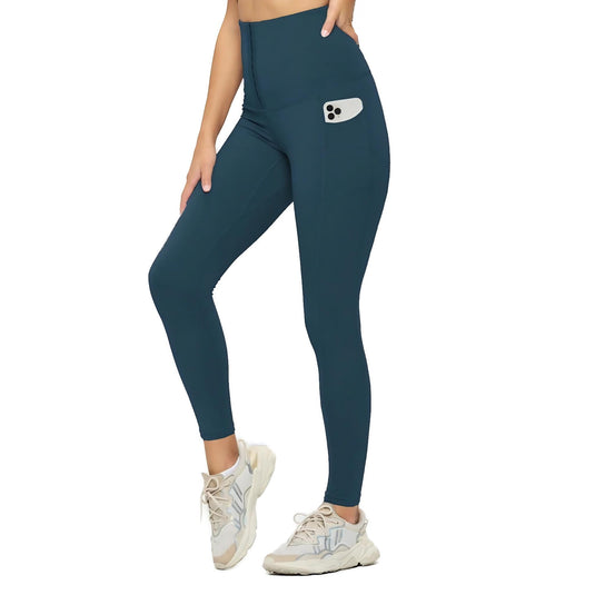 Ocean teal yoga leggings with a snug high waist and side pocket, designed for versatile movement and a touch of color to your workout wardrobe.