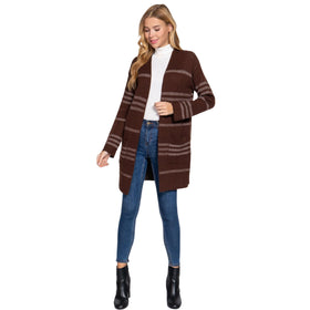 Full-length view of a stylish woman showcasing a long brown cardigan with cream stripes, complemented by a casual ensemble perfect for fall weather.