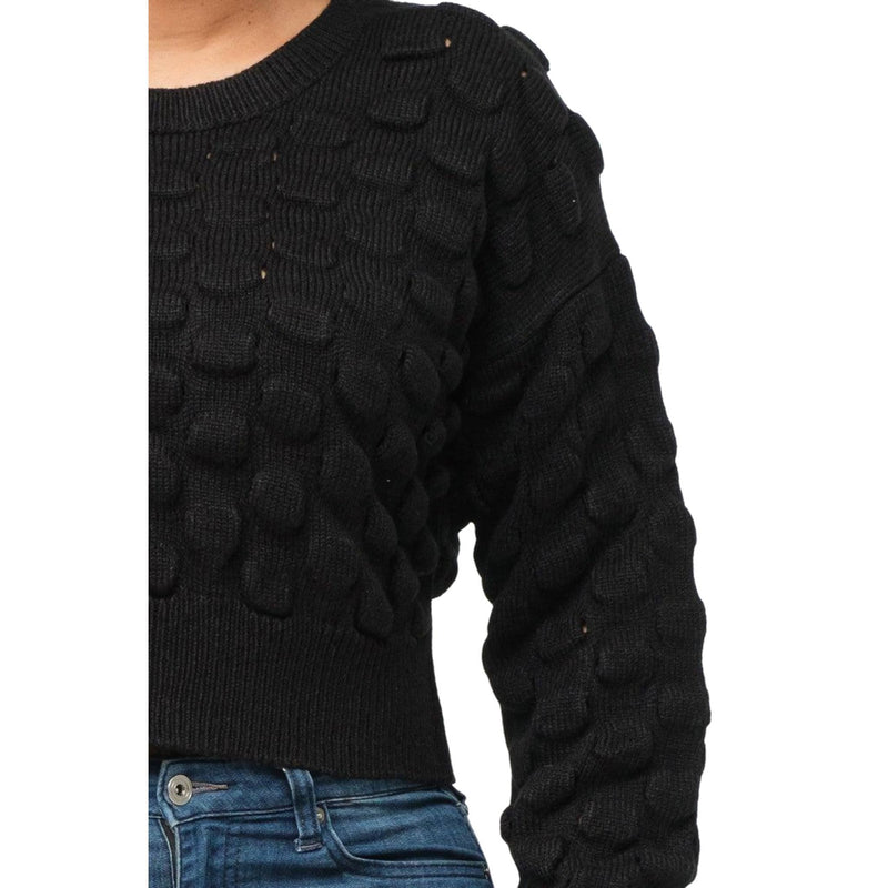 Load image into Gallery viewer, Close-up side view highlighting the intricate puffy checker detail of a cozy black sweater.
