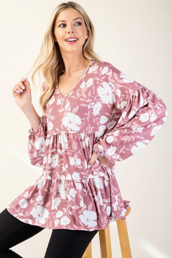 Front view of the model in the Celeste Tiered Floral V-Neck Long Sleeve Blouse, displaying the layered tiers and romantic floral pattern.