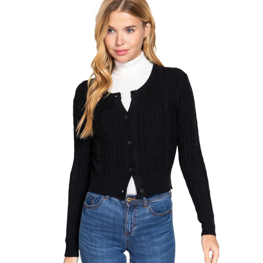 Elegant layered look with cable knit cardigan.