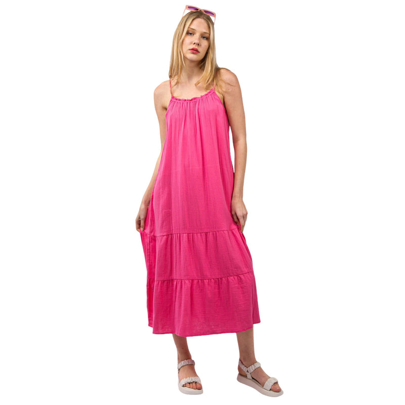 Load image into Gallery viewer, Full front view of a model wearing a pink cotton gauze A-line midi dress with adjustable straps, showing the dress&#39;s flowy and comfortable design.
