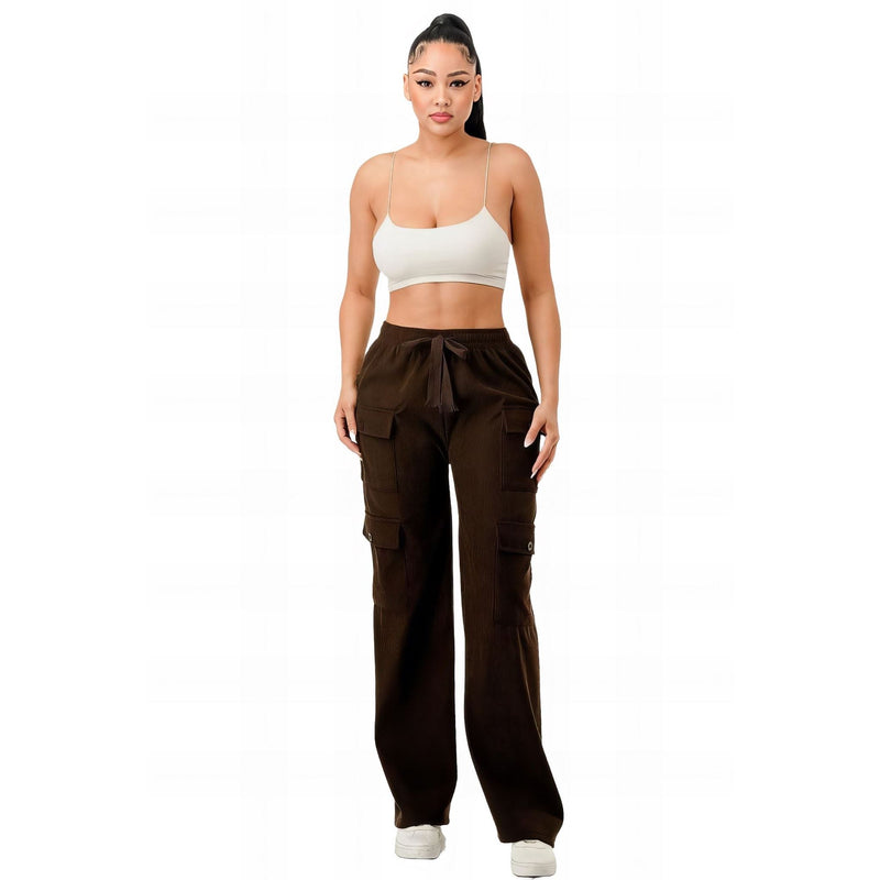 Load image into Gallery viewer, Chic female presenting a rich dark brown corduroy cargo pants with a contrasting white tank top, embodying a relaxed yet elegant aesthetic.
