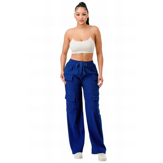 Striking royal blue corduroy cargo pants worn by a stylish woman, complemented with a simple white cropped top for a bold and vibrant statement.