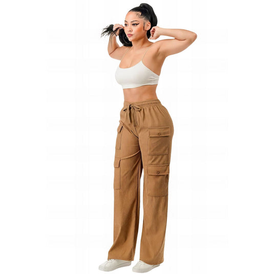 Model striking a pose in high-waisted khaki corduroy cargo pants with a fitted white tank top, highlighting the blend of comfort and urban style.