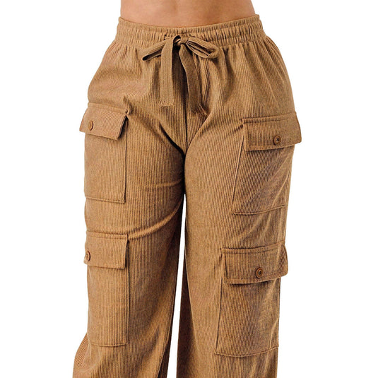 Close-up of the khaki corduroy cargo pants featuring spacious pockets and an elastic drawstring waist, emphasizing both style and functionality.