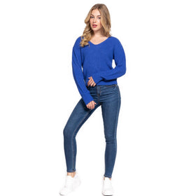 Model wearing a cozy royal blue dolman long sleeve sweater with a relaxed fit, perfect for a stylish yet comfortable look.