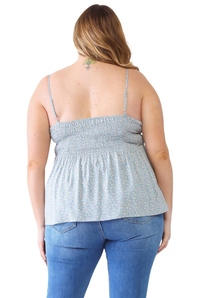 Load image into Gallery viewer, Plus-size model wearing a black floral smocked sweetheart neck cami paired with distressed jeans, perfect for a casual yet chic outfit.
