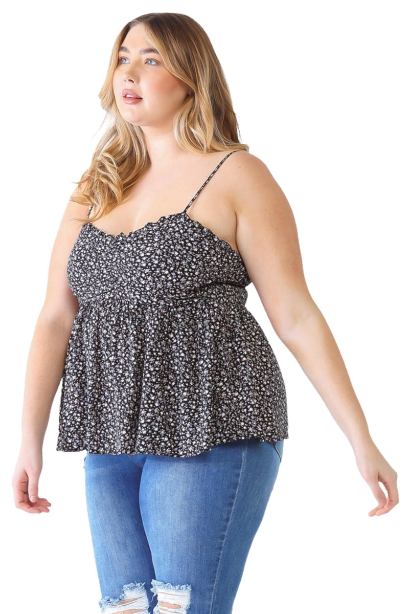 Load image into Gallery viewer, Plus-size model wearing a black floral smocked sweetheart neck cami, highlighting the ruffled neckline and ruching detail at the bust.
