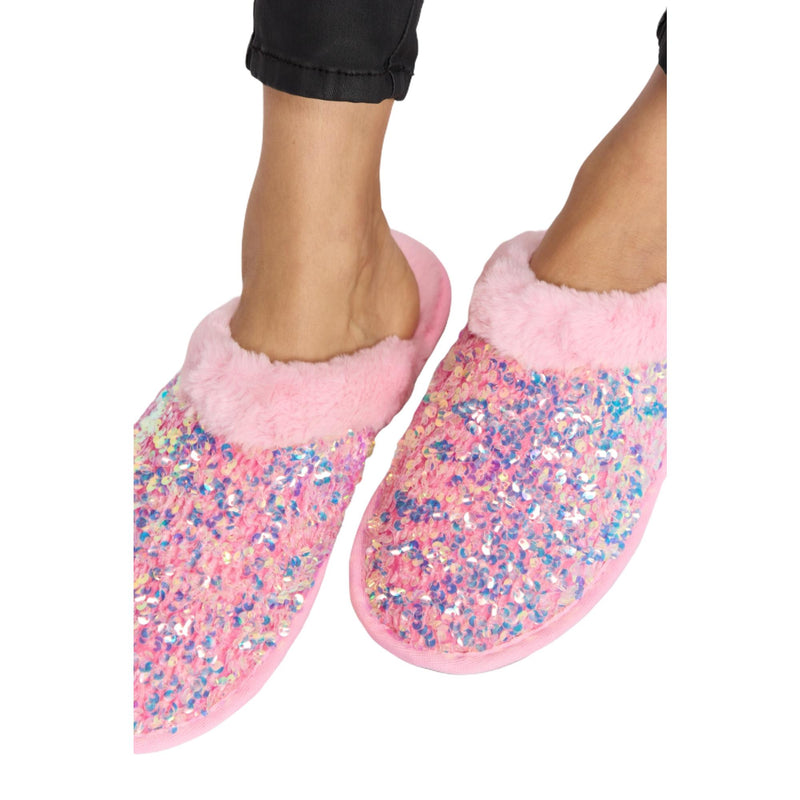 Load image into Gallery viewer, Close-up side view of pink sequin slippers being worn, emphasizing the detailed sequins and soft, fuzzy texture of the slippers&#39; interior.
