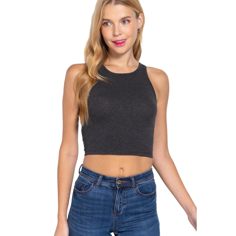 Load image into Gallery viewer, Fashionable woman in a charcoal grey crop top, posing with hands on hips, wearing blue jeans for a relaxed, trendy ensemble.
