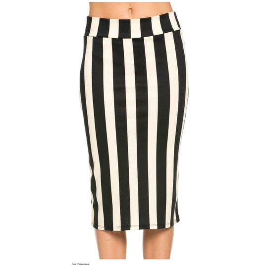 Front view of a high-rise, black and cream striped pencil skirt on a woman, illustrating the pencil silhouette and bold vertical stripe pattern.