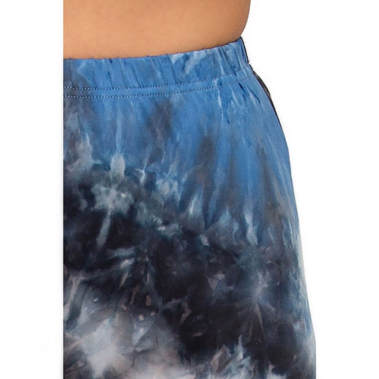 Close-up of the high-rise biker shorts in a blue and grey tie-dye pattern, focusing on the texture and colors.