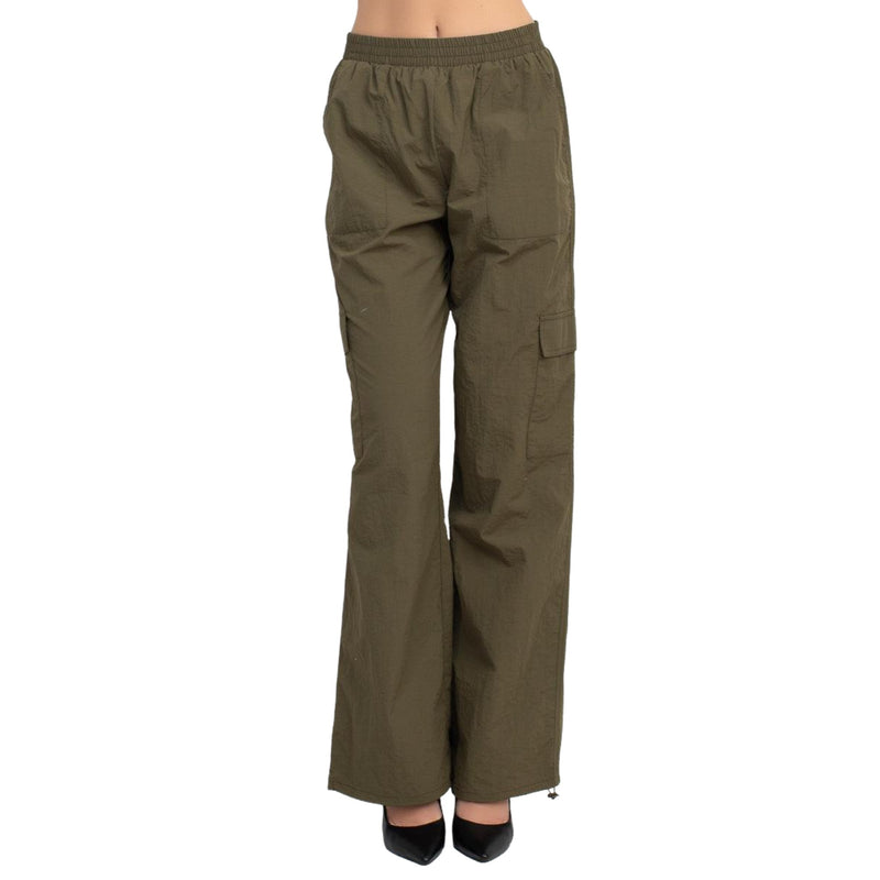 Load image into Gallery viewer, Front view of olive green high-rise cargo parachute pants with an elastic waistband. The pants feature a relaxed fit and multiple pockets, combining functionality with a stylish, casual look.
