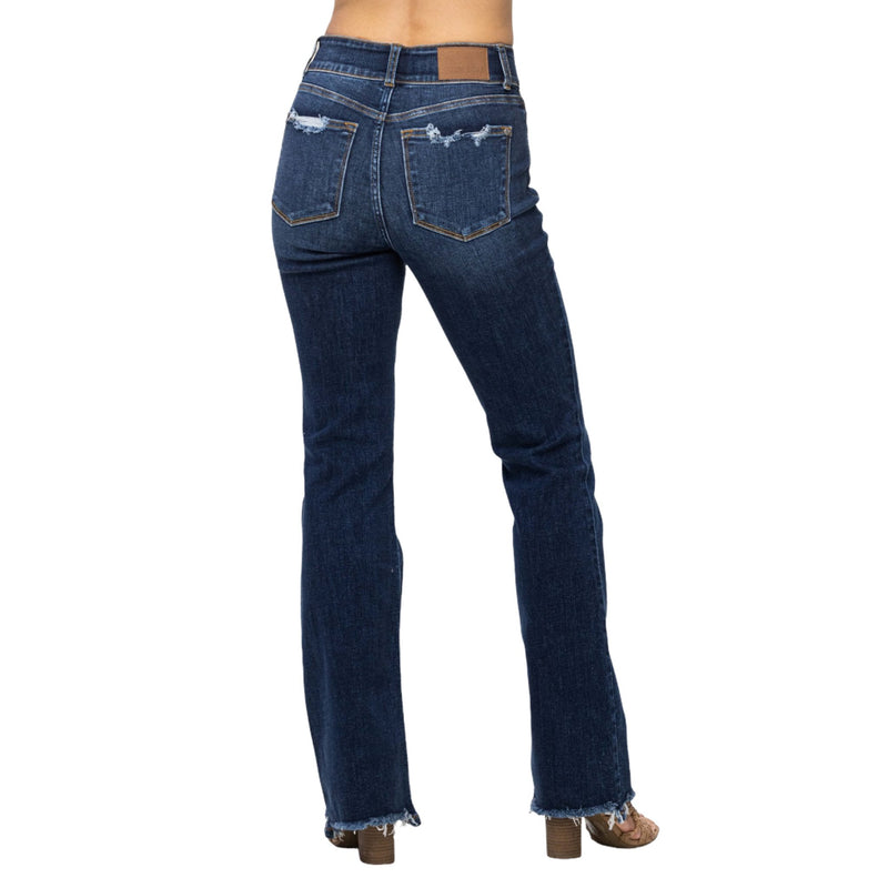 Load image into Gallery viewer, Back view of Judy Blue Full Size Frayed Hem Bootcut Jeans highlighting the distressed pocket details and frayed hem.
