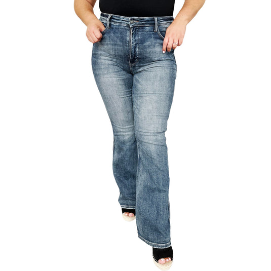 Front view of model wearing Judy Blue High Waist Tummy Control Flare Jeans, highlighting the flattering fit and flare leg design.