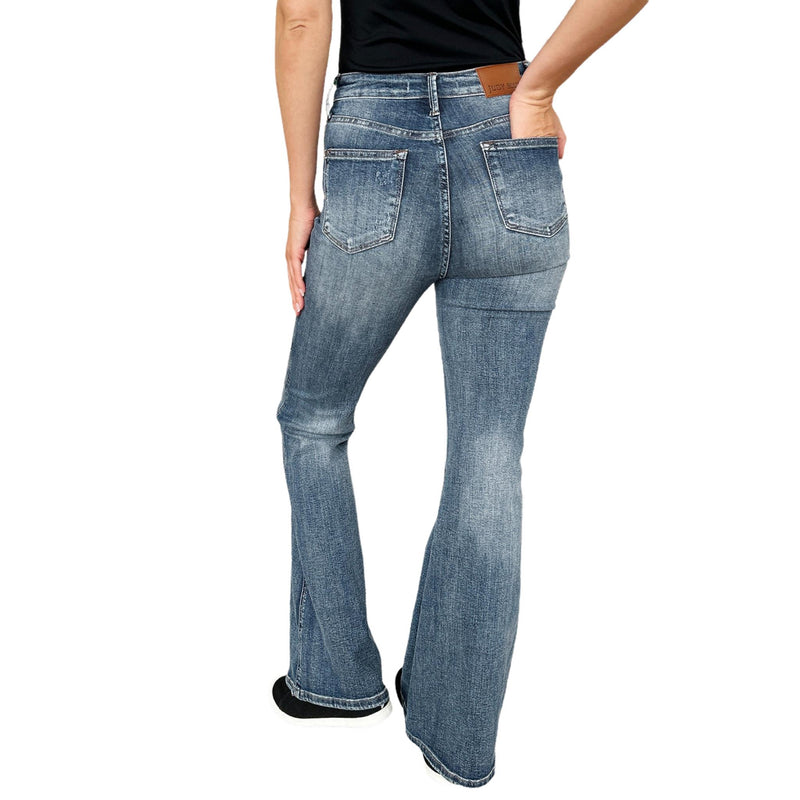 Load image into Gallery viewer, Rear view of Judy Blue High Waist Tummy Control Flare Jeans, showcasing the back pocket details and the flattering flare leg design.
