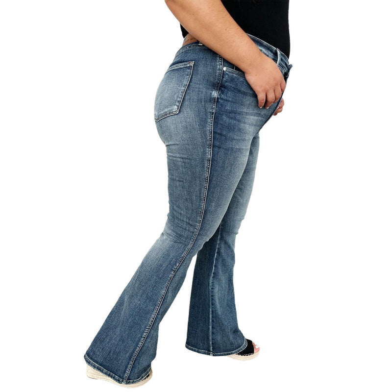 Load image into Gallery viewer, Profile view of Judy Blue High Waist Tummy Control Flare Jeans, showing off the flattering fit and flare style.
