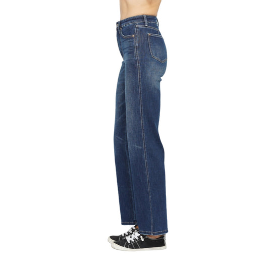 Side profile of Judy Blue High Waist Tummy Control Jeans, dark wash with black sneakers.