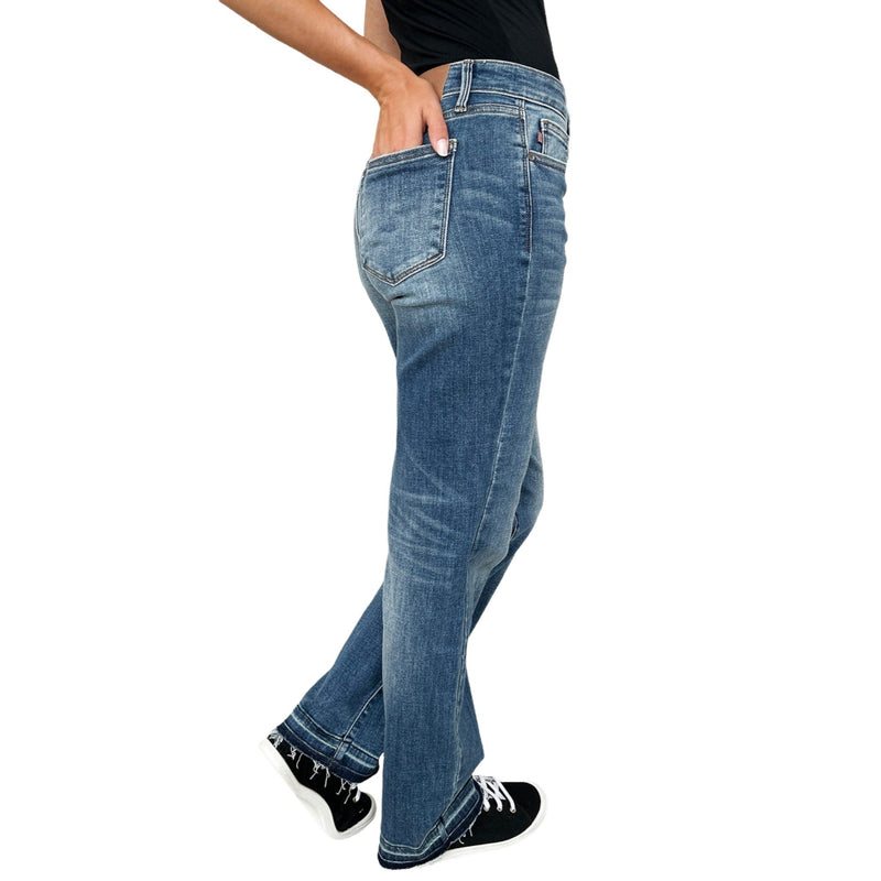 Load image into Gallery viewer, Side view of Judy Blue Full Size High Waist Tummy Control Jeans showing the clean lines and moderate stretch fabric.
