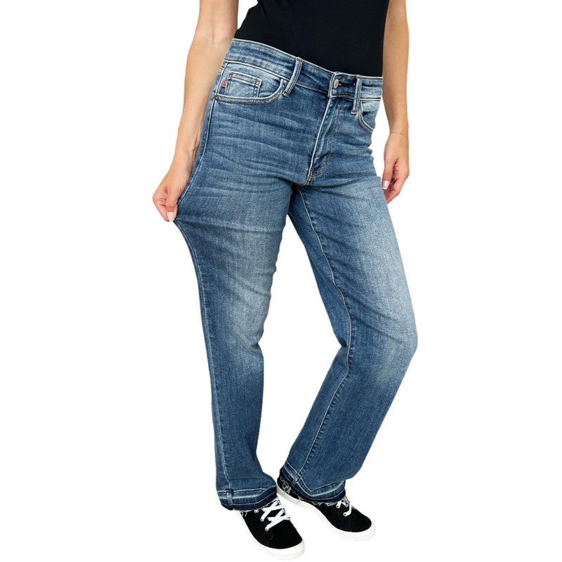 Load image into Gallery viewer, Demonstrating the stretchability of Judy Blue Full Size High Waist Tummy Control Jeans with a slight pull at the leg.
