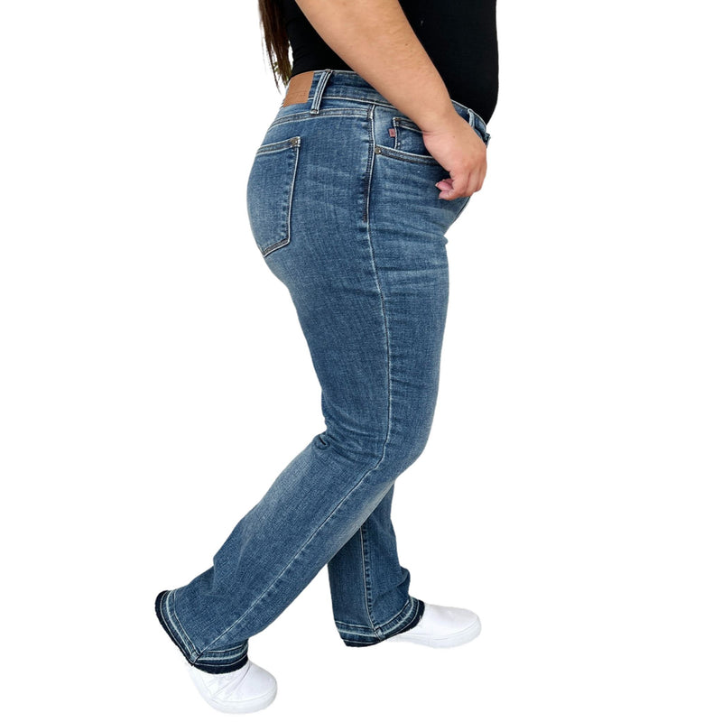 Load image into Gallery viewer, Side view of Judy Blue Full Size High Waist Tummy Control Jeans, showing the sleek and flattering fit.
