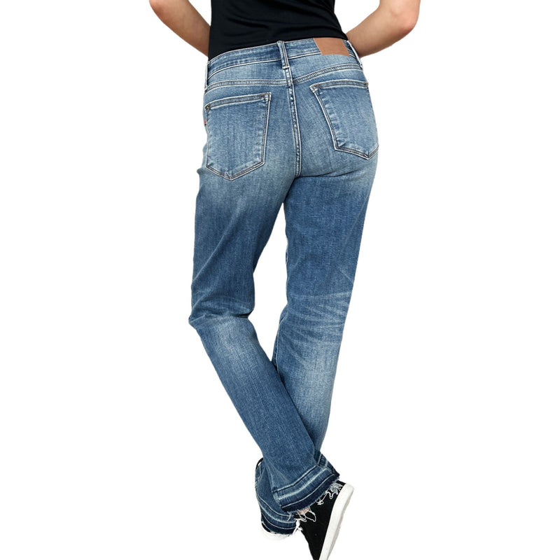 Load image into Gallery viewer, Back view of a woman wearing Judy Blue Full Size Mid Rise Release Hem Jeans, showcasing the moderate stretch and fit.
