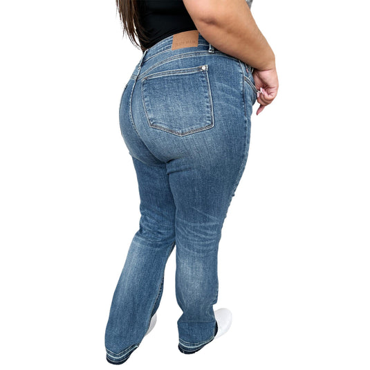 Back and side view of Judy Blue Full Size Mid Rise Release Hem Jeans, highlighting the high-quality denim and rear pockets.