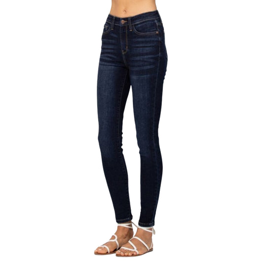 Close-up of Classic High Waist Skinny Jeans in dark wash, showing the high waist design and sleek skinny fit.