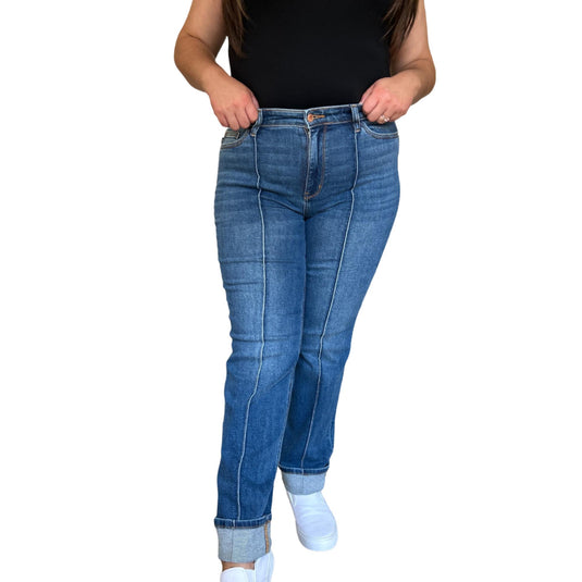 A front view of a woman wearing the High Waist Front Seam Detail Straight Jeans, highlighting the sleek front seam detail and timeless straight-leg fit.