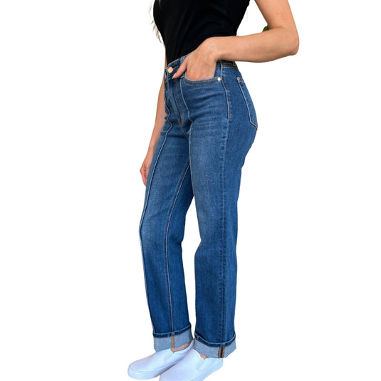 A side view of a woman wearing the High Waist Front Seam Detail Straight Jeans, highlighting the sleek front seam and high-waisted fit.