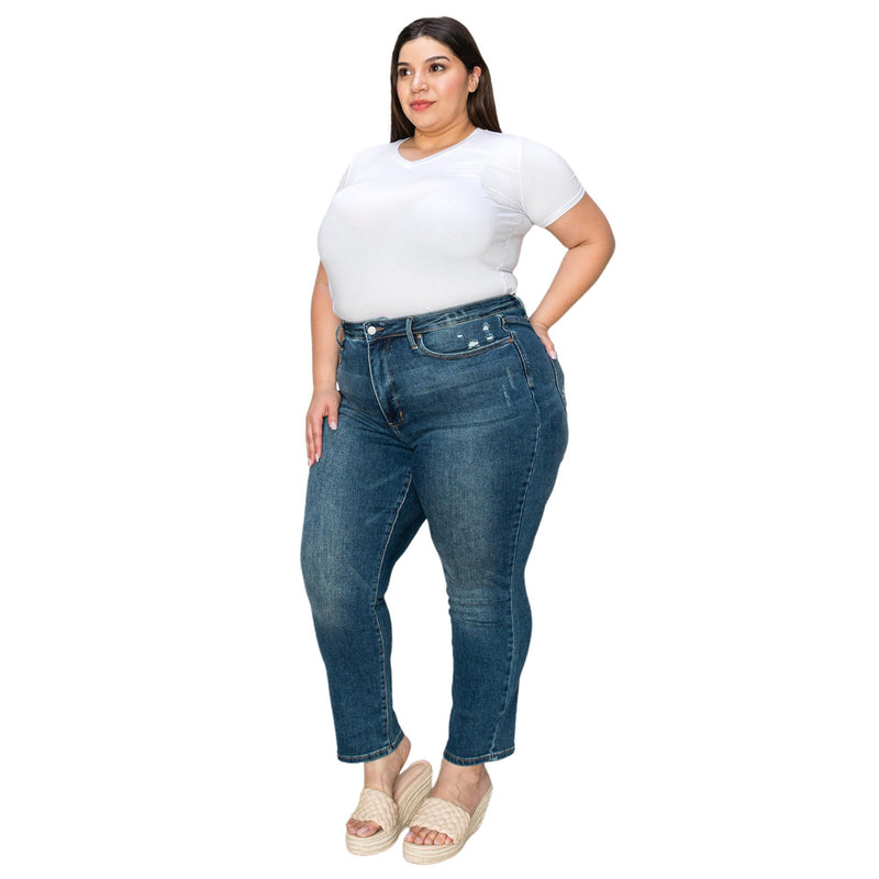 Load image into Gallery viewer, Plus-size woman wearing a white short-sleeve shirt and high-waisted dark wash jeans with distressed detailing, standing with one hand in her pocket.
