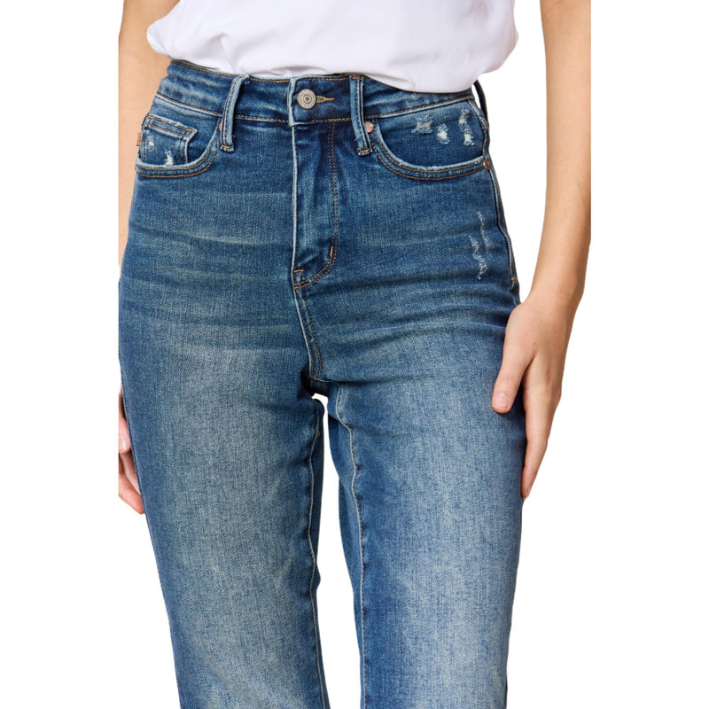 Load image into Gallery viewer, Close-up of Judy Blue high waist tummy control slim jeans, showcasing the detailed stitching around the waist and subtle distressing near the pockets.
