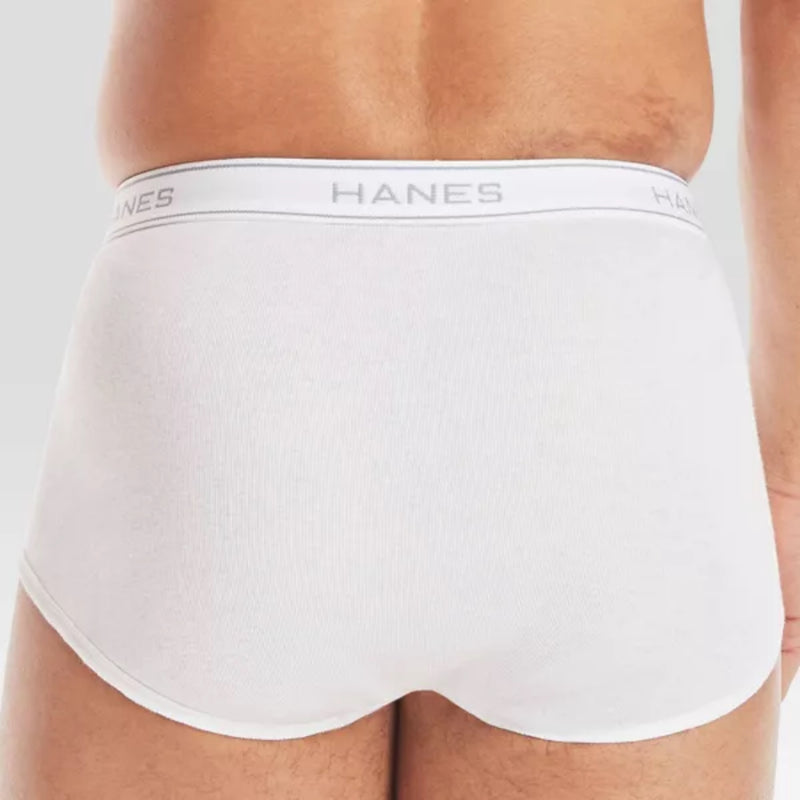 Load image into Gallery viewer, Rear view of a man’s midsection wearing white Hanes tagless briefs, showcasing the waistband and back design.
