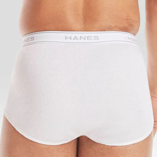 Rear view of a man’s midsection wearing white Hanes tagless briefs, showcasing the waistband and back design.