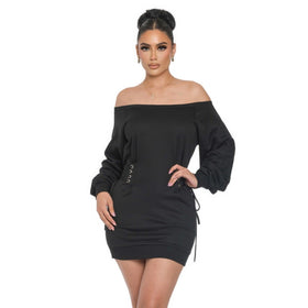 Front view of a woman in an off-shoulder black mini dress with puff sleeves and side lace-ups. The dress highlights a chic off-shoulder style and stylish lace-up details, perfect for a modern and elegant appearance.