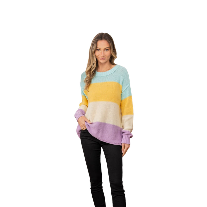 Load image into Gallery viewer, Front view of the Pastel Color Block Exposed Seam Sweater with a model showing off the cozy, modern knitwear in a casual setting.
