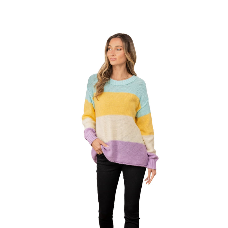 Load image into Gallery viewer, Woman wearing a Pastel Color Block Exposed Seam Sweater in light blue, yellow, cream, and lavender
