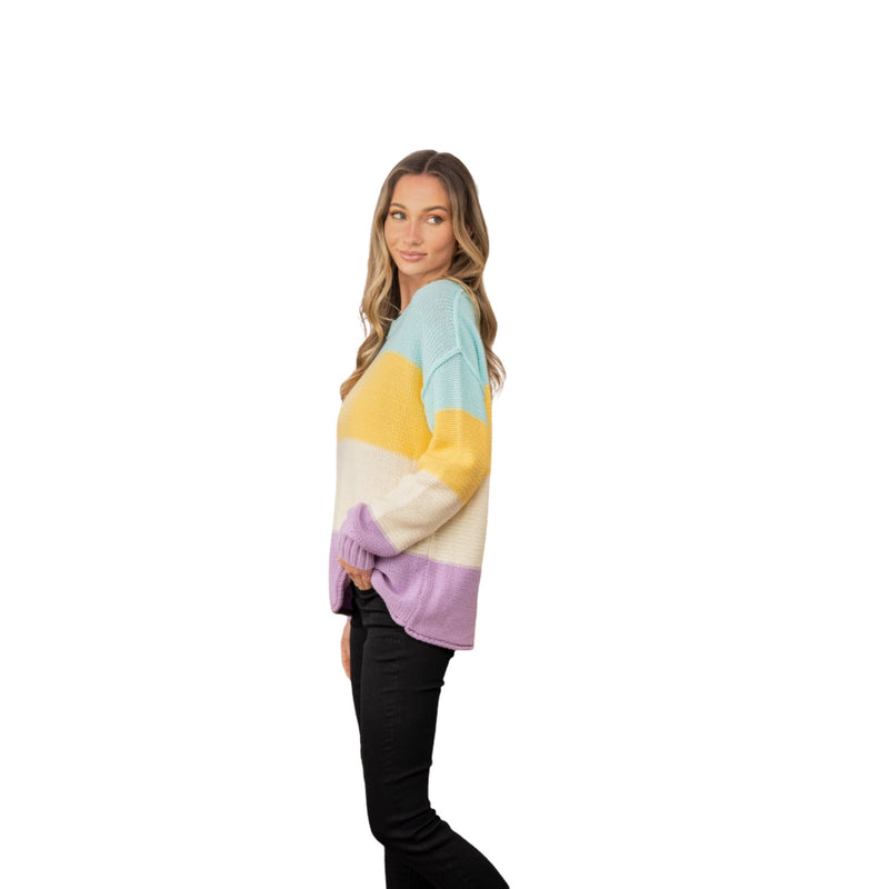 Load image into Gallery viewer, Side view of the Pastel Color Block Exposed Seam Sweater showcasing the pastel color block pattern and exposed seam details.
