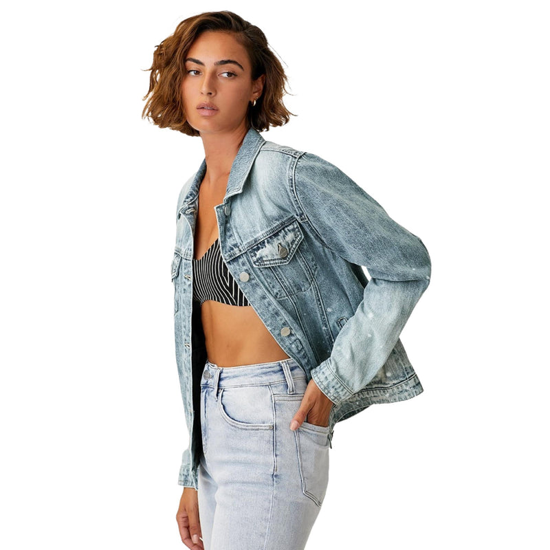 Load image into Gallery viewer,  Side view of a woman in an ombre washed denim jacket, highlighting the relaxed fit and gradient color, paired with light-wash jeans.
